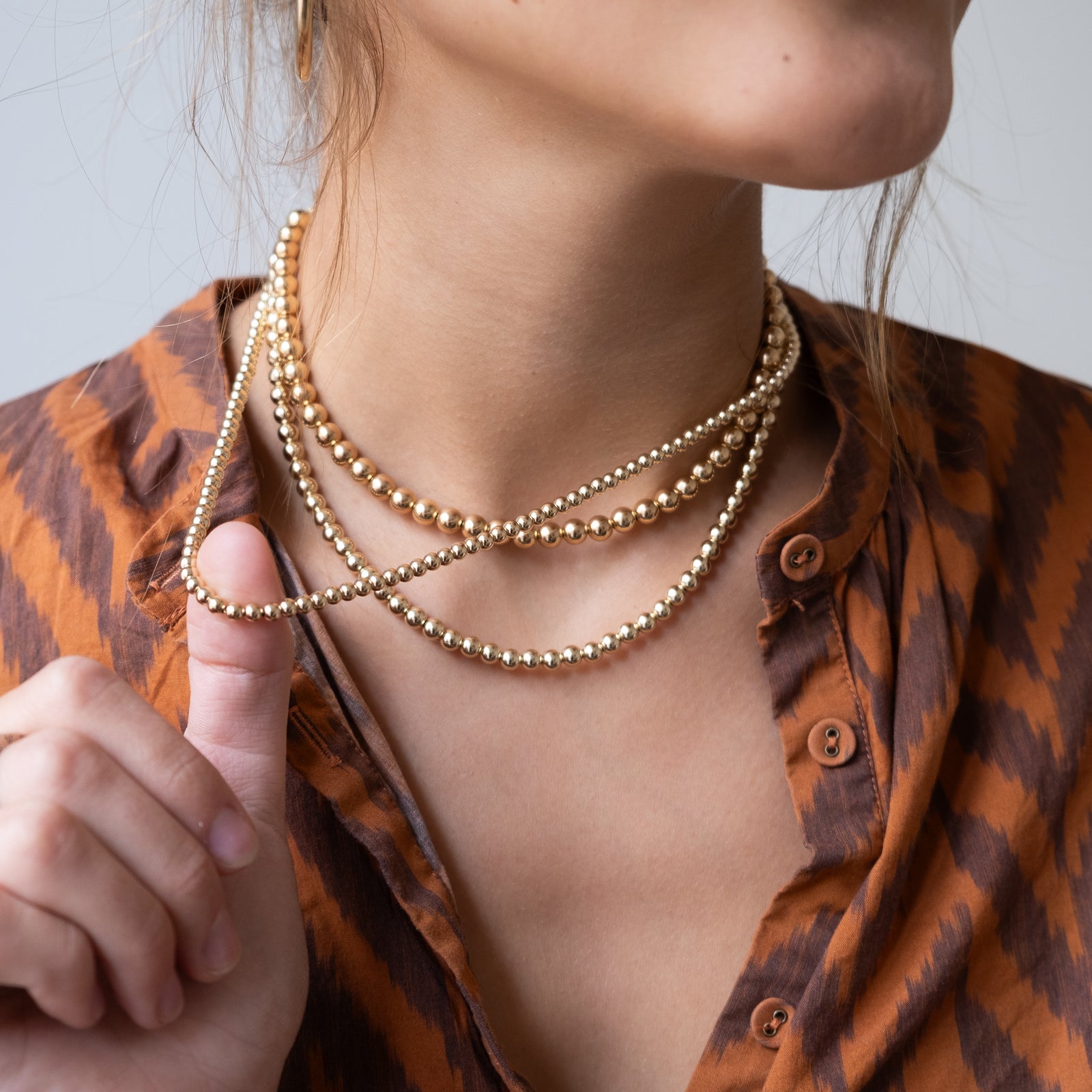 Beautiful Gold store tone Artisan Beaded Necklace With Large Pendant and Gold toned Ch